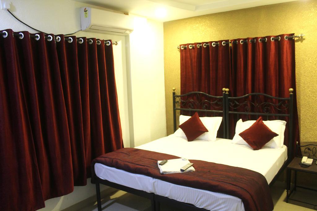 Hotel Preetam Aurangabad Szoba fotó