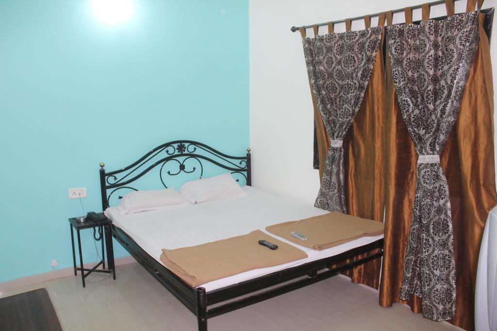 Hotel Preetam Aurangabad Szoba fotó