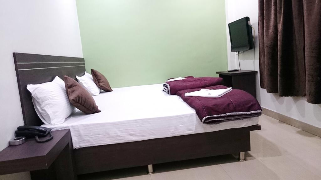 Hotel Preetam Aurangabad Szoba fotó